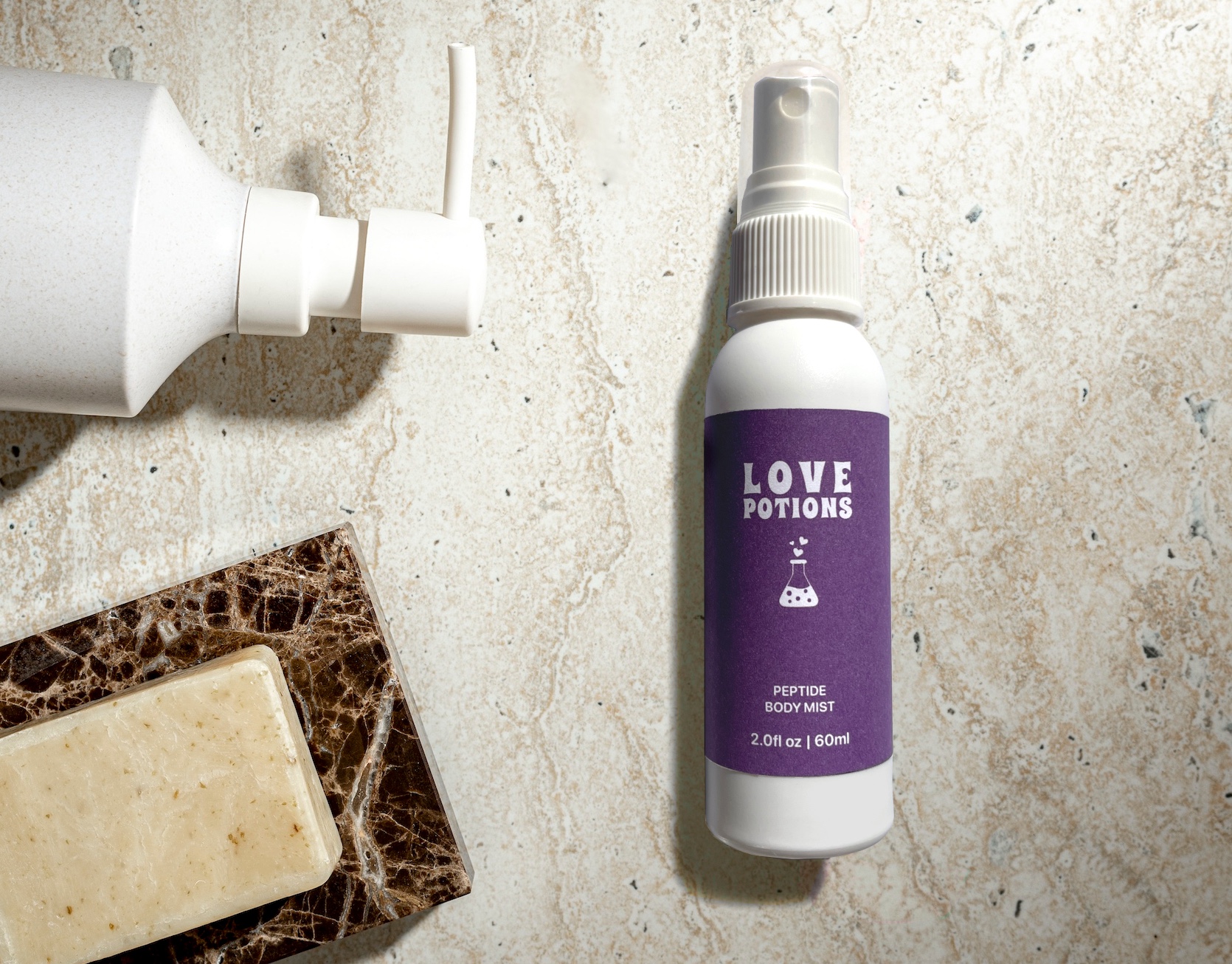 Love Potions peptide body mist beside soap and a pump bottle